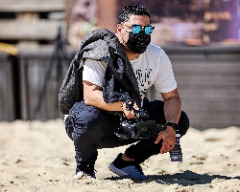 Shooting at beach volleyball.